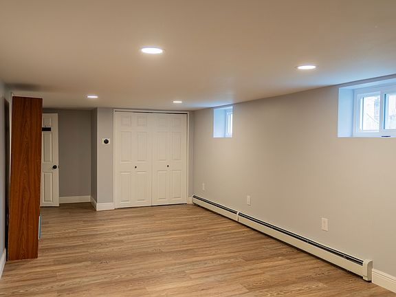Lounging area - perfect space for a couch and TV, mini fridge, and/or exercise equipment!