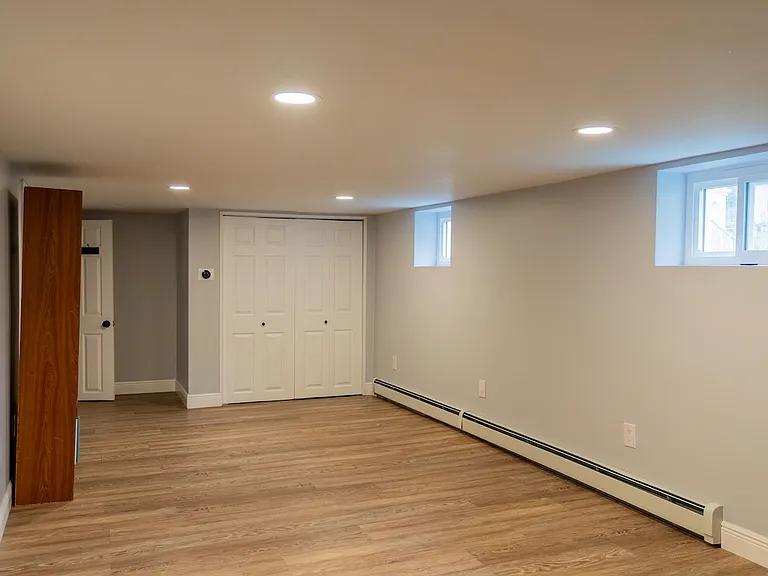 Lounging area - perfect space for a couch and TV, mini fridge, and/or exercise equipment!