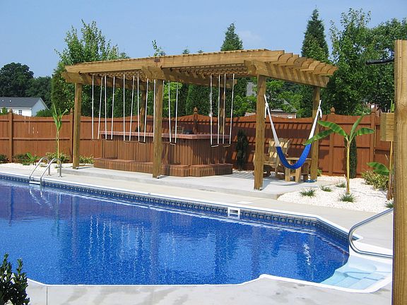 In-ground pool shade pergola