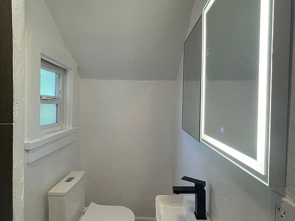 All new bathroom with gorgeous vanity mirror