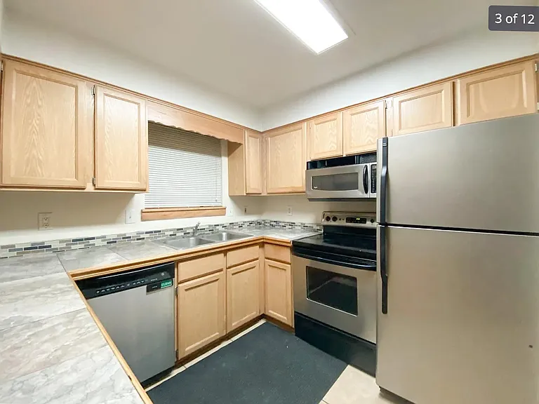 4387 S Acoma St — Photo 2