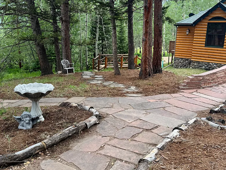 Flagstone walkway to cabin