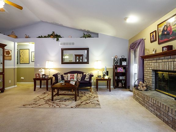 with vaulted ceiling and fireplace