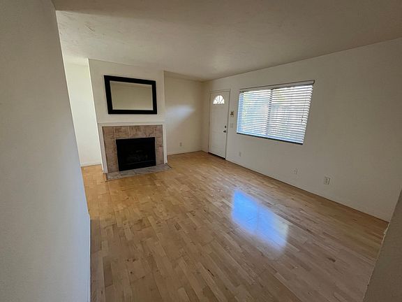 Living room with entry.