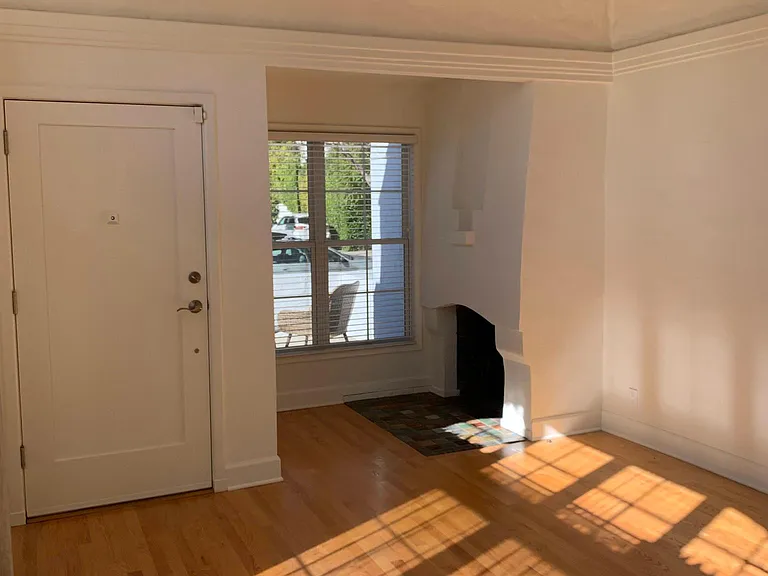 Living room with decorative fireplace