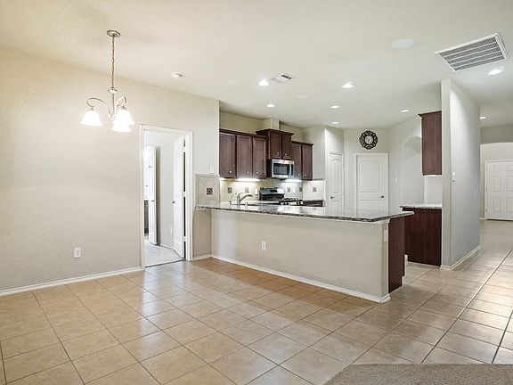 Spacious kitchen with peninsula and eat in kitchen.