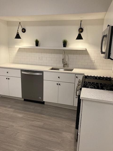 Kitchen. New cabinets, appliances. New bamboo flooring.