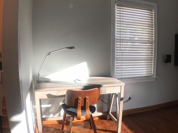 Living room with corner for work desk