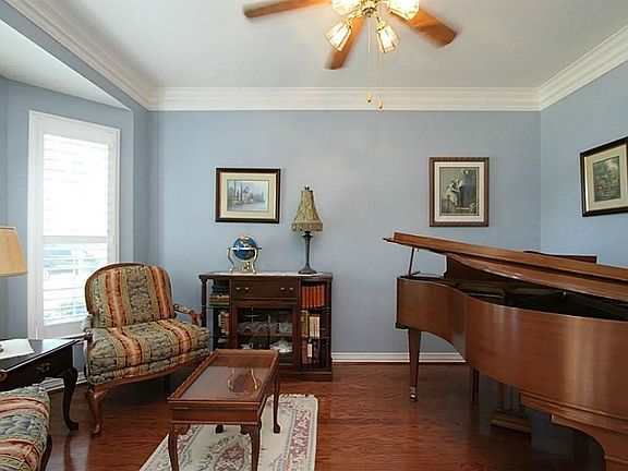 Study: This large room with a bay window at the front of the home is perfect for an executive study,