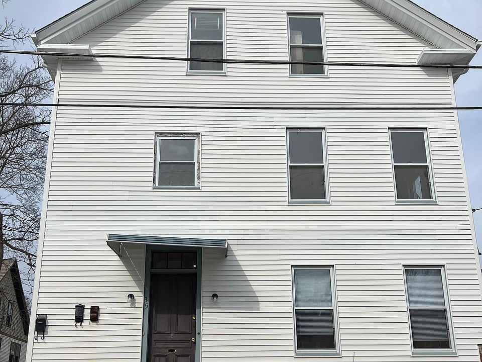 Front of house (Missing porch at the time, there is a back door)