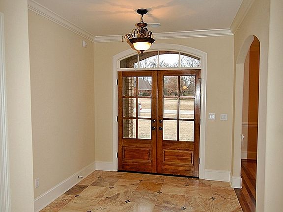 Double door Entry and lovely marble floor.