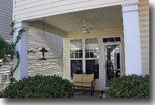 Covered back porch just off Kitchen & Dining Room.