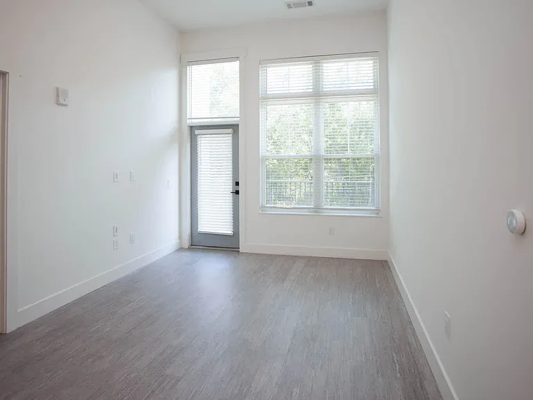 Living Room with Balcony and Hard Surface Flooring