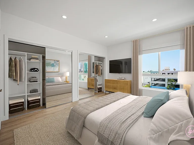 Primary Bedroom with Two-Mirrored Closets, Large-Size Windows, and Recessed Lighting- Eagle Floor Plan