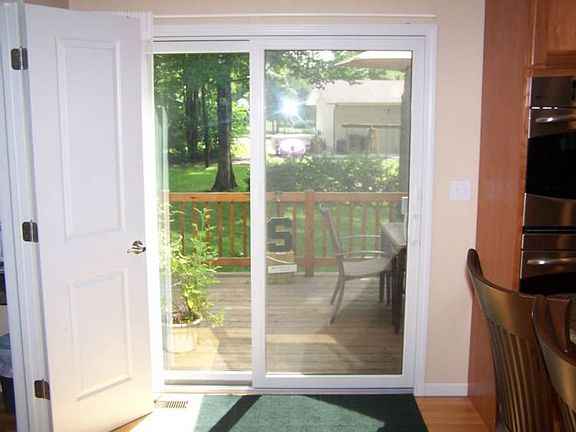 Slider off kitchen to one of the decks.