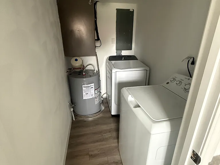 Laundry room. New Washer & Dryer included.