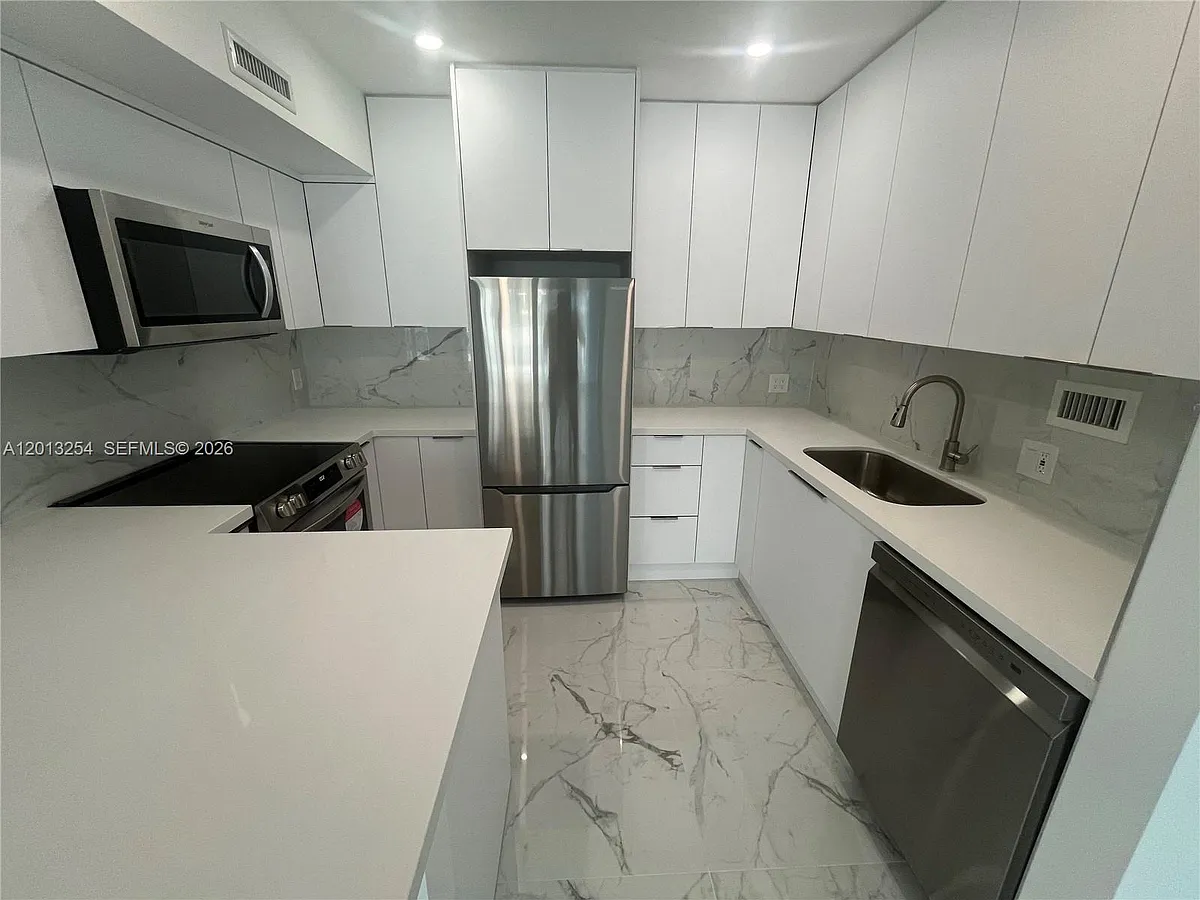 Building Photo - 3505 S Ocean Dr #210