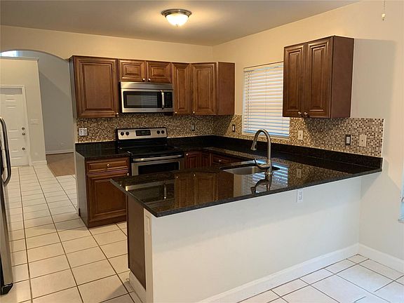 5th image of 6010 NW 44th Way