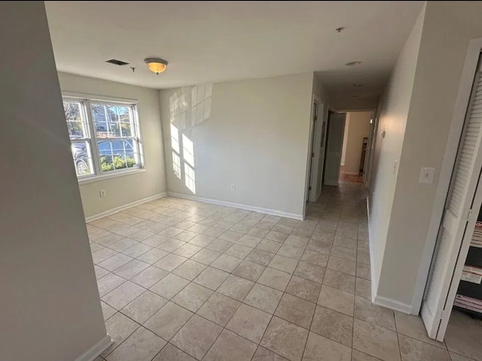 Small dining area outside kitchen and hallway
