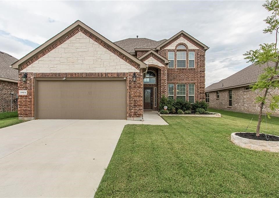 Lovely brick & stone elevation!