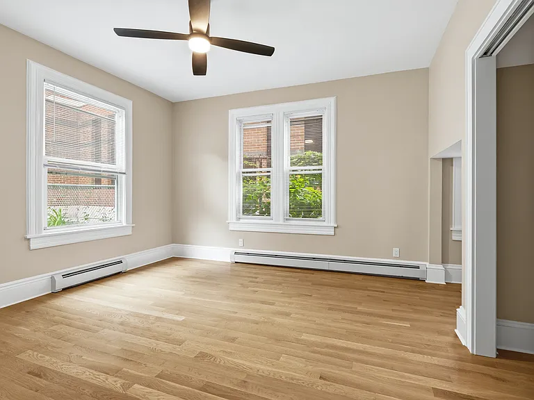 The stunning main bedroom has plenty of space for all your needs.