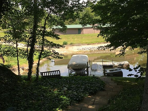 Steps to dock & lake.