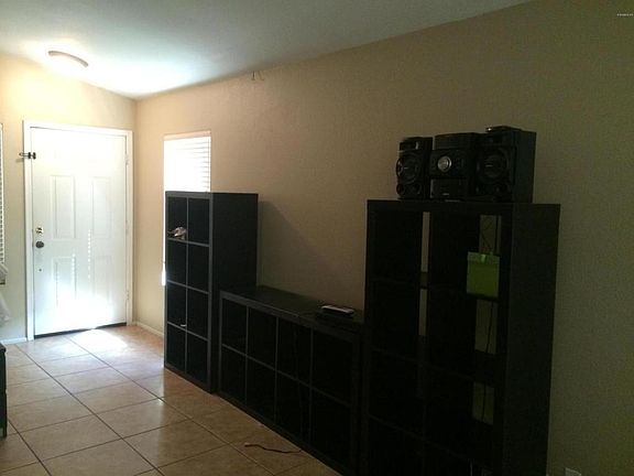 Spacious family room with vaulted ceilings.