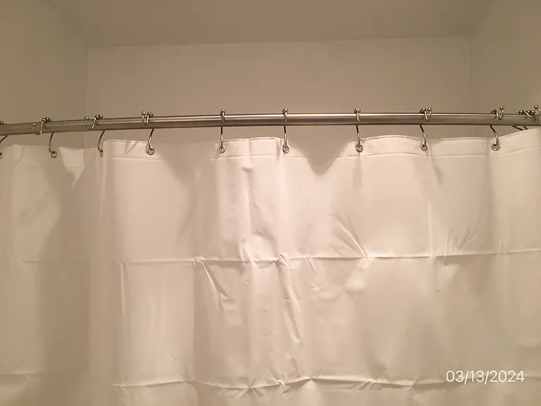 new inner shower curtain, new shower rod