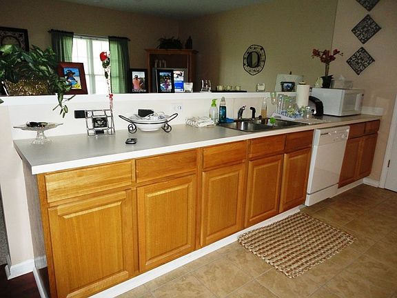 Kitchen looking into living room