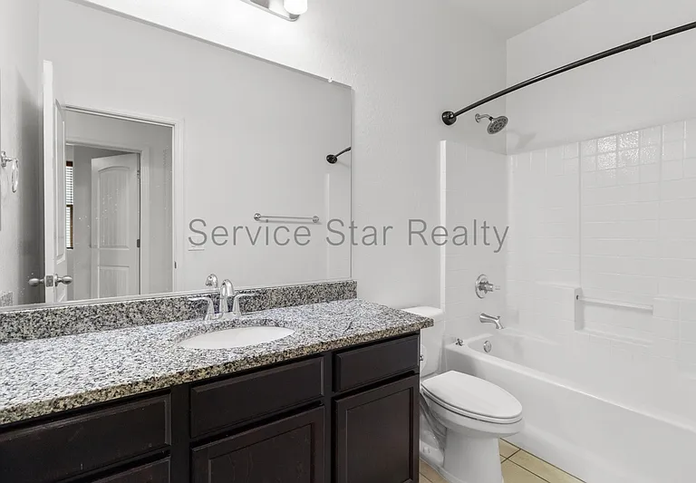7309 S 12th Dr — Photo 12