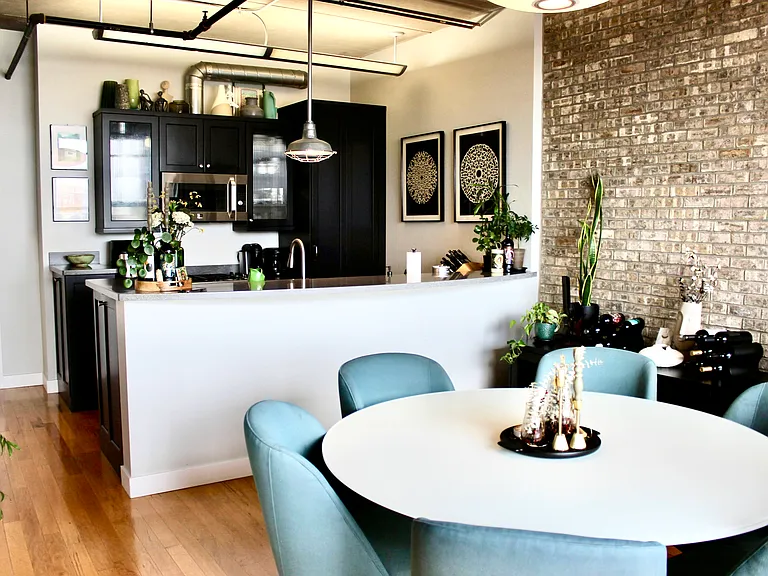 Kitchen with Bar Area and Living Space/Dining Room