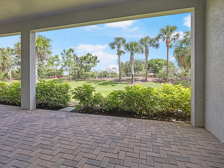 6133 Lungo Lago Dr — Photo 39