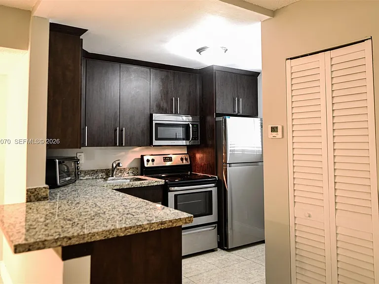 703 Gardens Dr #102 — Photo 6