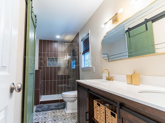 Updated Master Bathroom w/soaking tub and rainfall shower head.
