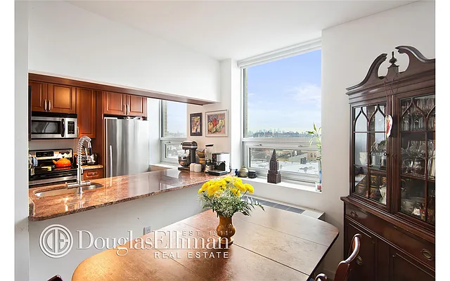 Sold by Douglas Elliman | media 13