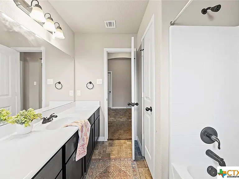 Spare Bathroom (flooring in photo is old)