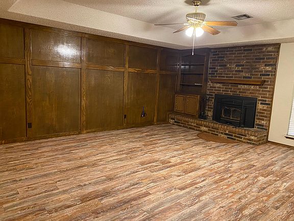 Photo 2 of living room with fireplace.