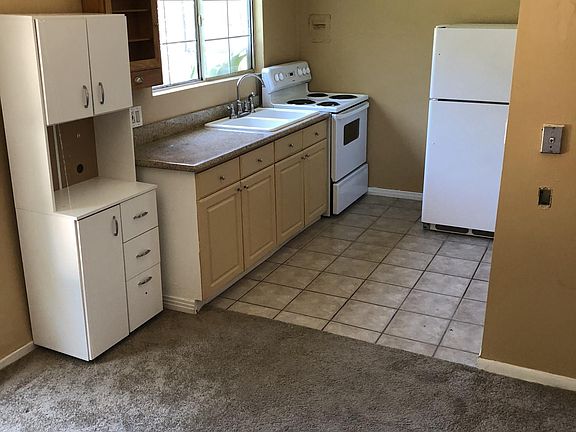 Kitchen includes stove and frig.