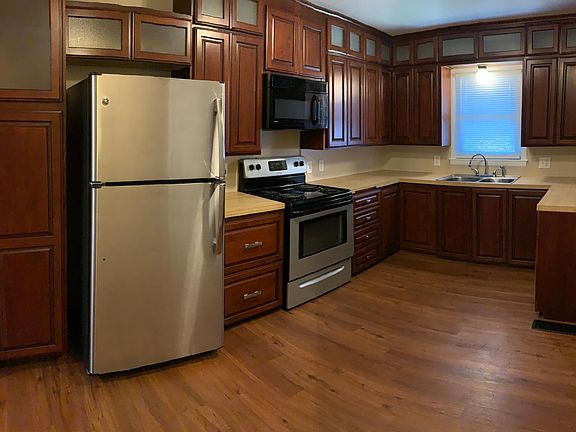 Beautiful kitchen with lots of cabinets and stainless appliances