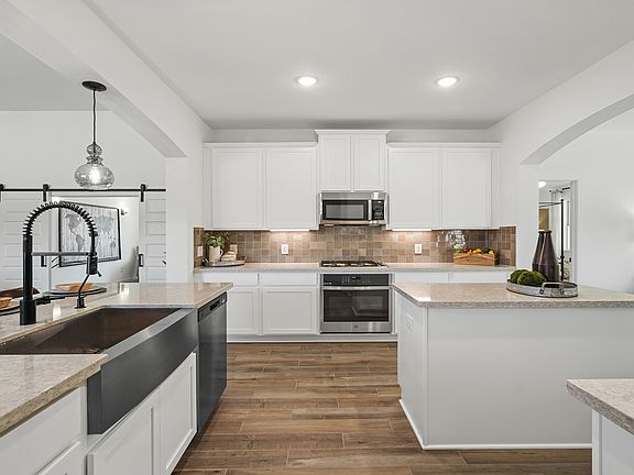 Charming sink in gourmet kitchen