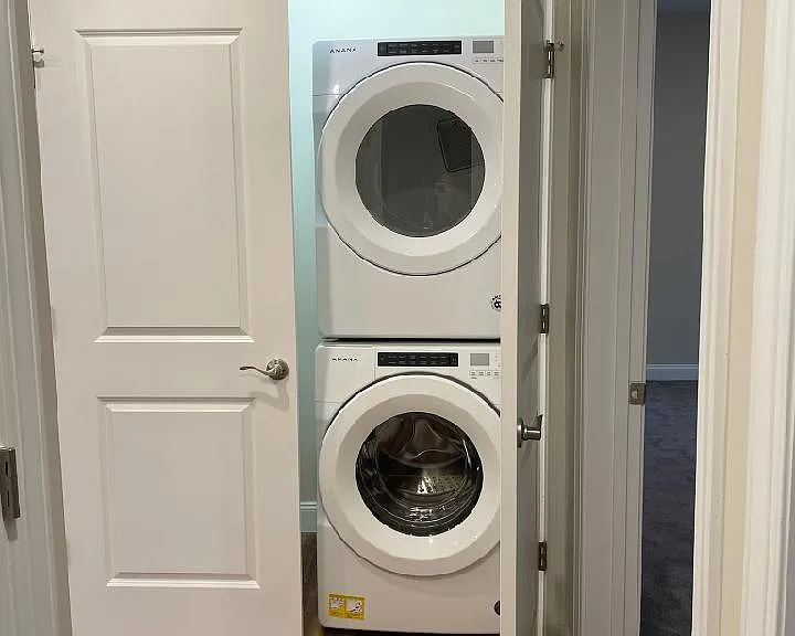Full Size Washer & Dryer With Extra Space In Closet For Laundry Baskets & Organizers.