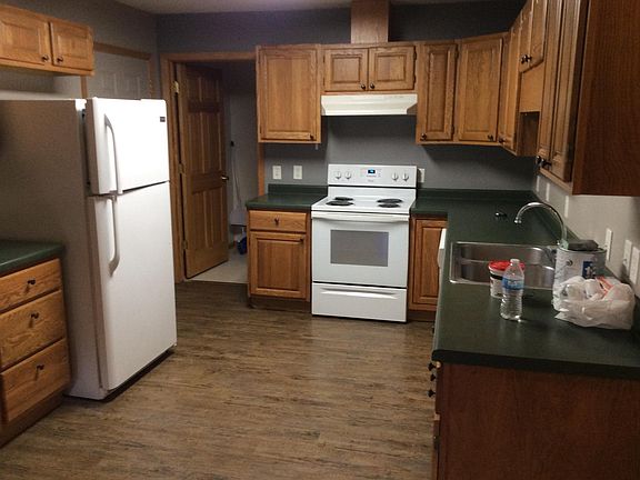 Kitchen with access to laundry area and attached garage