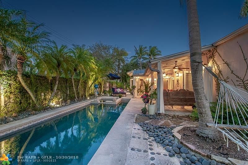 Florida Key West styled home offers a resort spa feeling. Three bedroom, two bath & half with beautful addition that offers impa