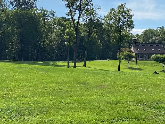 View as you drive into the parking area for the Guest House.
