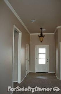Entryway/Foyer
						:
						Open floor plan, foyer opens into living room and is adjoined by the study.