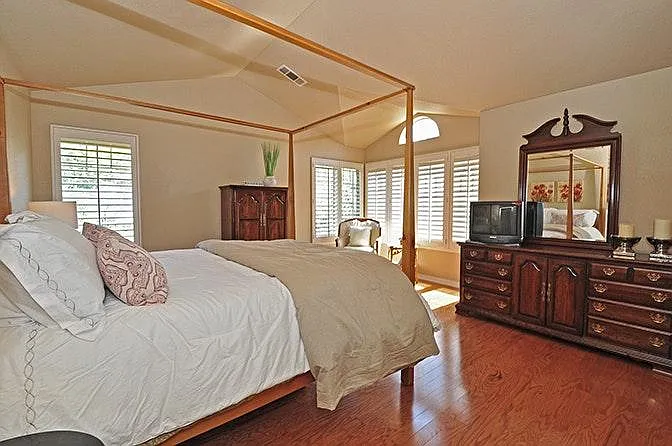 Master bedroom suite with vaulted cailings