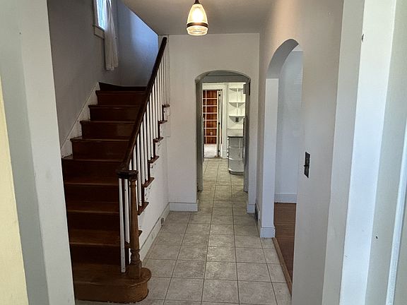 Entry foyer (large closet on right) Living Room on right. Kitchen straight ahead.