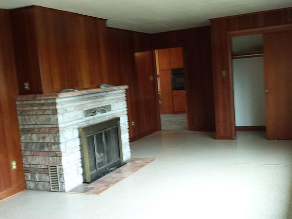 Den with view to backyard and panoramic views