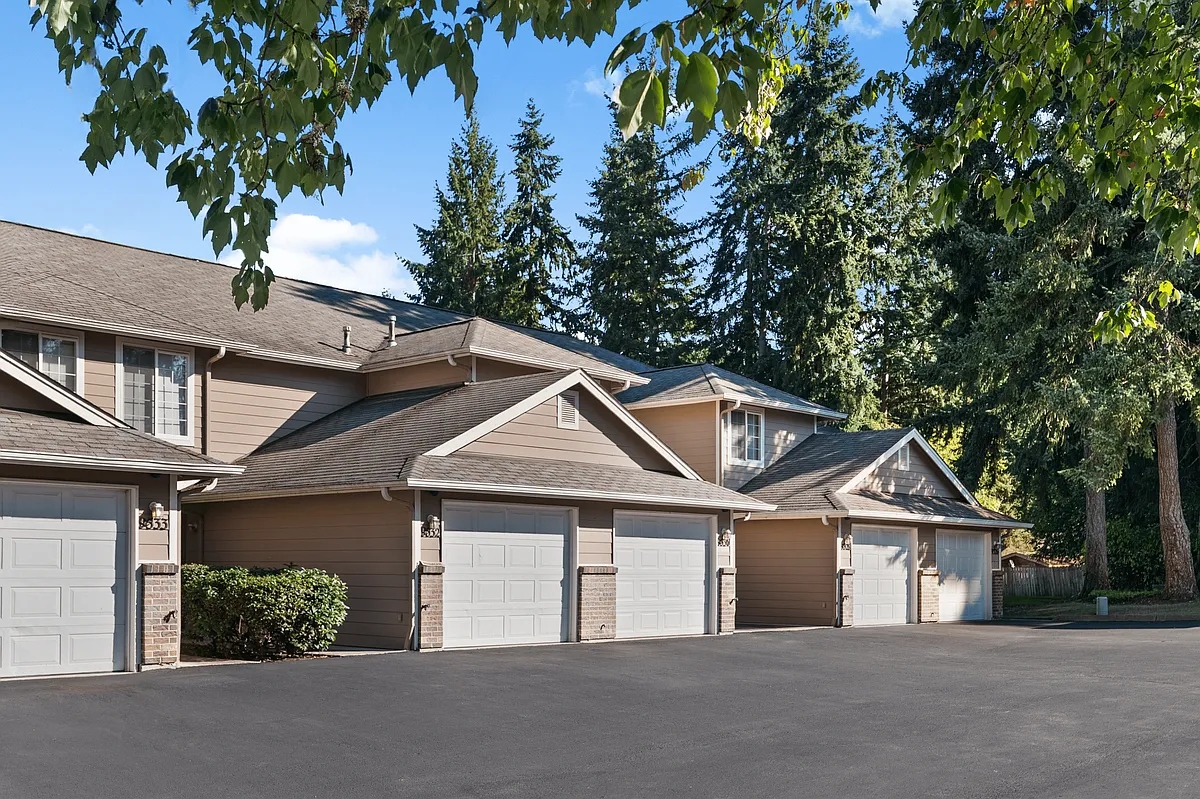 Attached garages provide convenient parking and direct access at Mountain Park Townhomes. - Mountain Park Townhomes