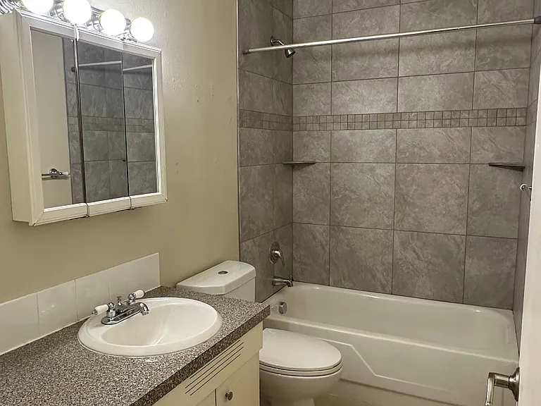 Bathroom with shower-tub combo